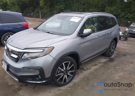 2021 Honda Pilot Elite from USA, damaged, VIN 5FNYF6H07MB057330